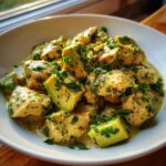 Close-up of creamy chicken chunks and avocado pieces in a light green sauce, perfect for a Quick Low-Carb Dinner.