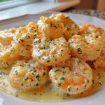 Close-up of plump shrimp coated in a rich, creamy garlic sauce and sprinkled with fresh parsley, showcasing the Creamy Garlic Shrimp recipe.