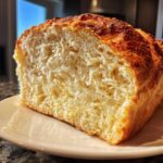 A close-up cross-section showing the incredibly soft and airy crumb of the Fluffy Yeast Bread Homemade Soft Bread.