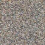 Abstract, grainy background texture, possibly representing a countertop or surface near the Strawberry Shortcake.